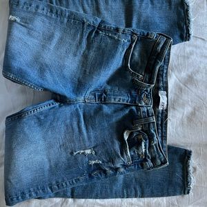 Zara medium to dark wash mid rise skinny jeans with ripped knee